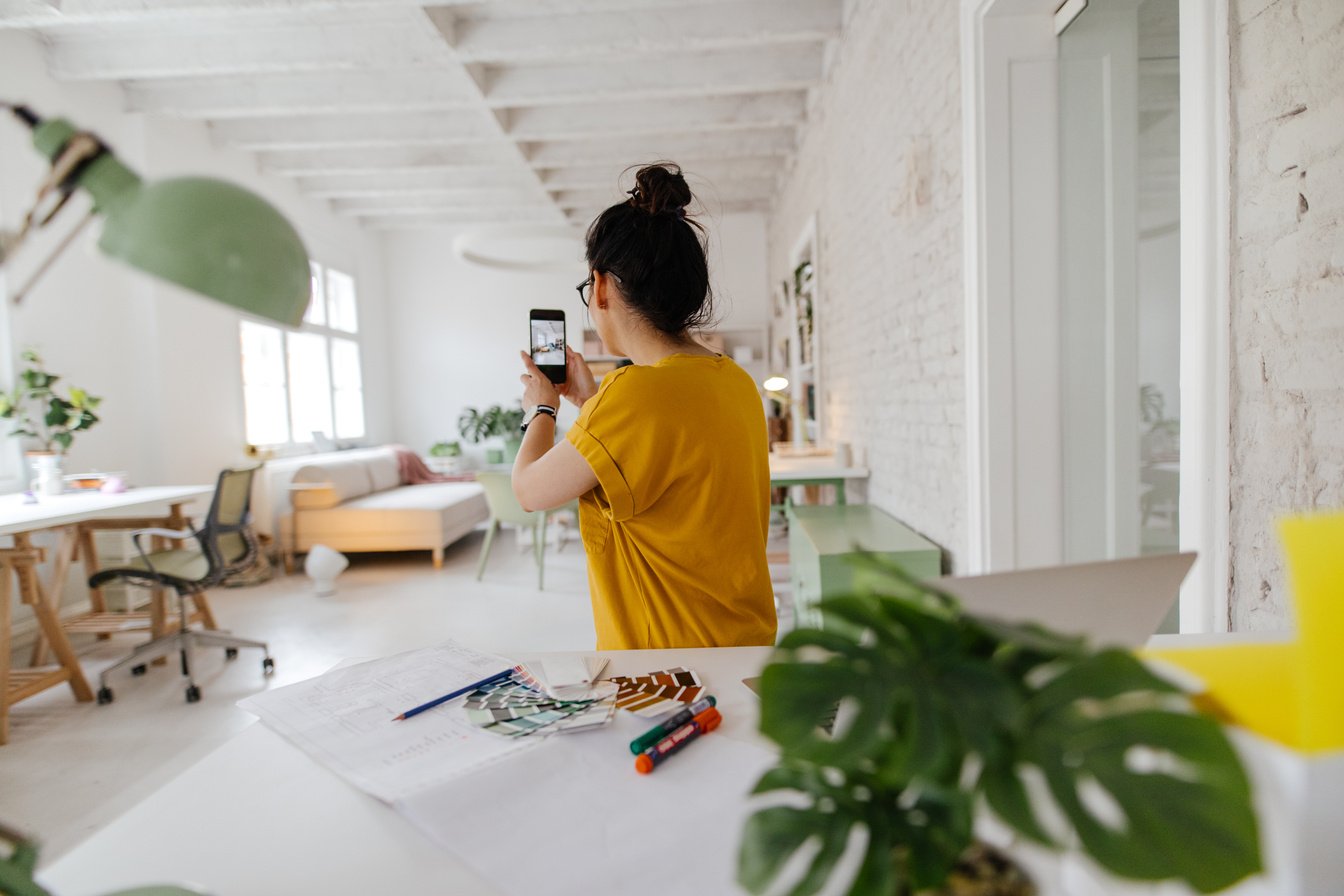 Interior designer photographing interior